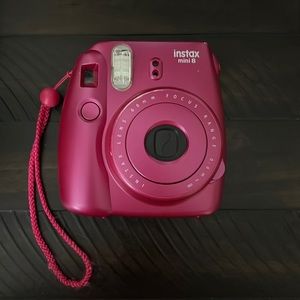 Hot pink Polaroid Camera
